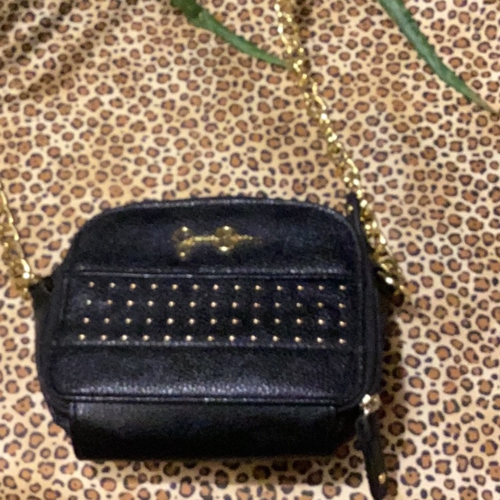 Adorable like new without tags Jessica Simpson crossbody travel bag.